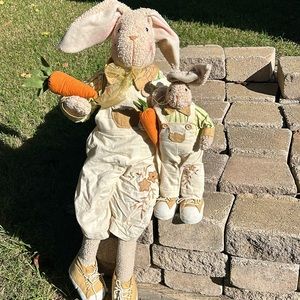 Sitting bunny with a small standing bunny
